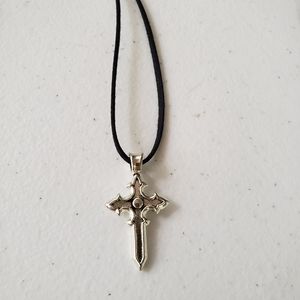 Silver tone Cross with Cord